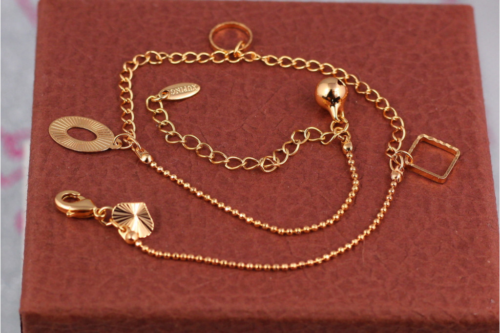 Браслет Xuping Jewelry на ногу ромбик круг овал 23 см добавка цепи 5 см золотистый