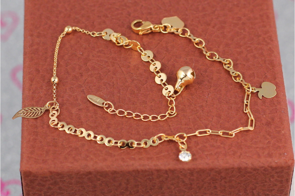 Браслет Xuping Jewelry на ногу листочок камінь яблучко 24 см домішка ланцюга 3 см золотистий