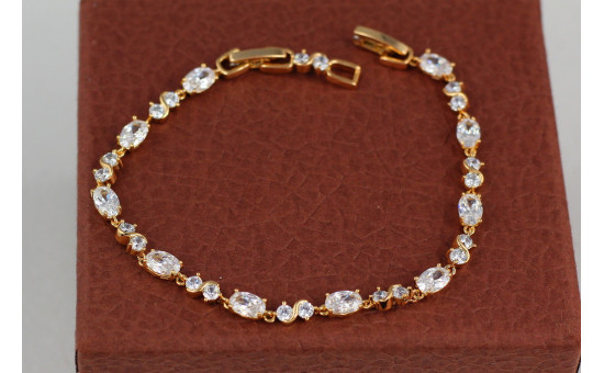 Браслет Xuping Jewelry хвилі з білими каменями 21 см 4 мм золотистий