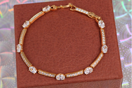 Браслет Xuping Jewelry доріжки з білими овальними каменями 18 см 5 мм золотистий