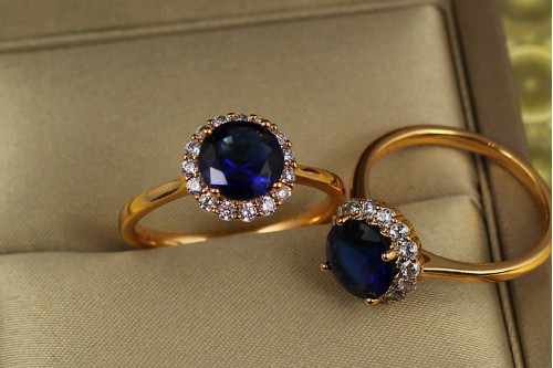Кольцо Xuping Jewelry две площадки с синим камнем р 20  золотистое