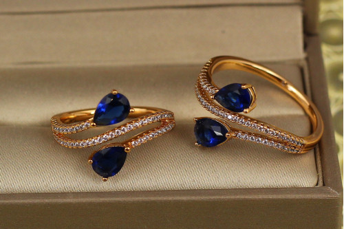 Кільце Xuping Jewelry зустрічні краплі із синіми каменями р 17 золотисте