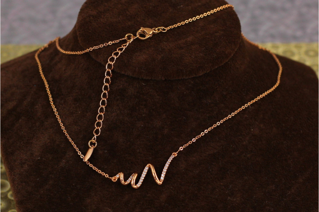 Набор  Xuping Jewelry цепь с кулоном фигурное катание 40 см добор 5 см золотистый