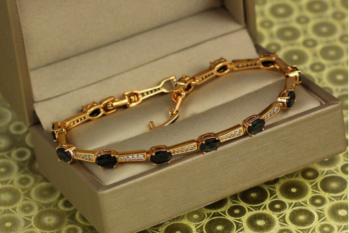 Браслет Xuping Jewelry доріжки з чорними овальними каменями 17 см 4 мм золотистий