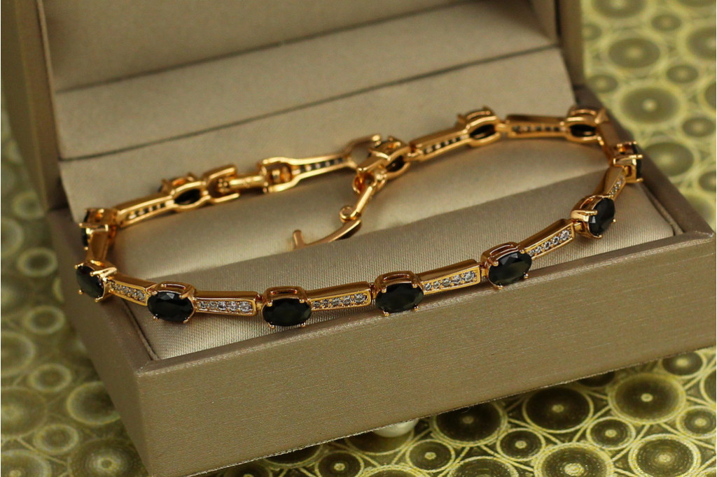 Браслет Xuping Jewelry доріжки з чорними овальними каменями 17 см 4 мм золотистий