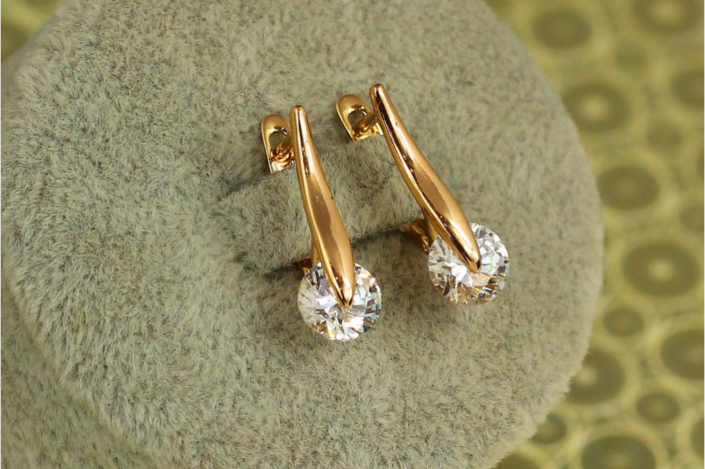 Сережки Xuping Jewelry Повітруля з білим каменем 2 см золотисті