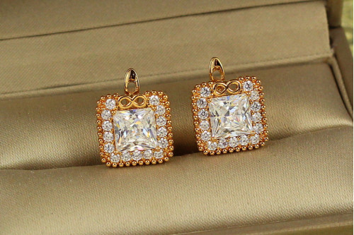 Сережки Xuping Jewelry вічність з білим каменем 1,3 см золотисті