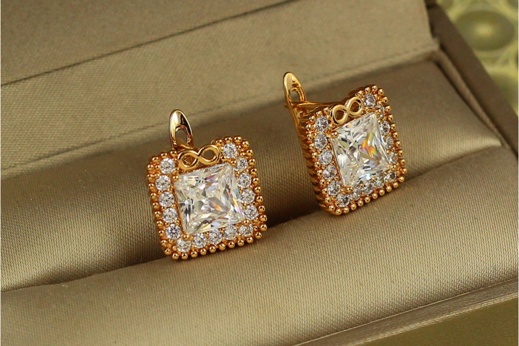 Серьги Xuping Jewelry вечность с белым камнем 1,3 см золотистые