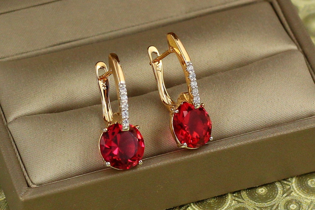 Сережки Xuping Jewelry Стрілка з родієм із великим малиновим каменем 2,7 см золотисті