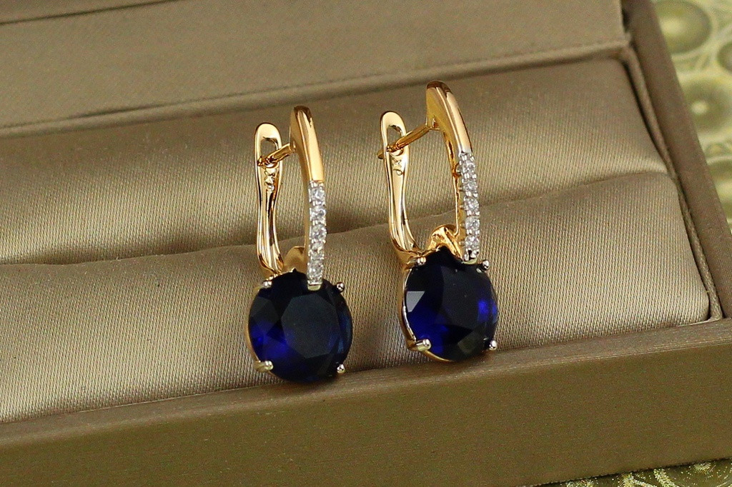 Сережки Xuping Jewelry Стрілка з родієм із великим синім каменем 2,7 см золотисті