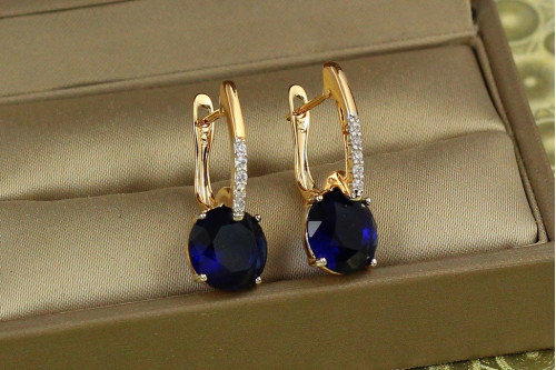 Сережки Xuping Jewelry Стрілка з родієм із великим синім каменем 2,7 см золотисті