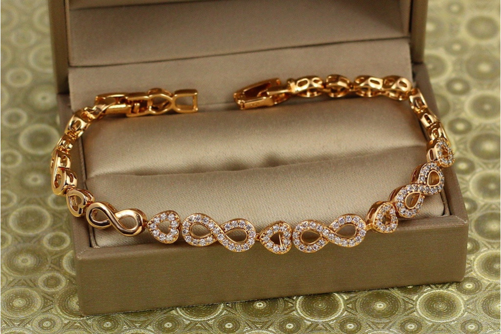 Браслет Xuping Jewelry вісімки із сердечками 17 см золотистий