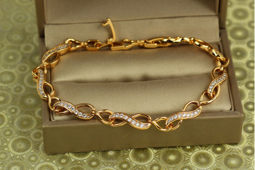Браслет Xuping Jewelry Вісімки з камінчиками 19 см 5 мм золотистий