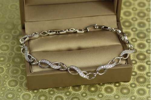 Браслет Xuping Jewelry Вісімки з камінчиками 19 см 5 мм сріблястий