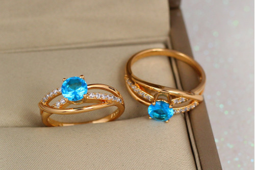 Кольцо Xuping Jewelry волны с голубым камнем р 20 золотистое