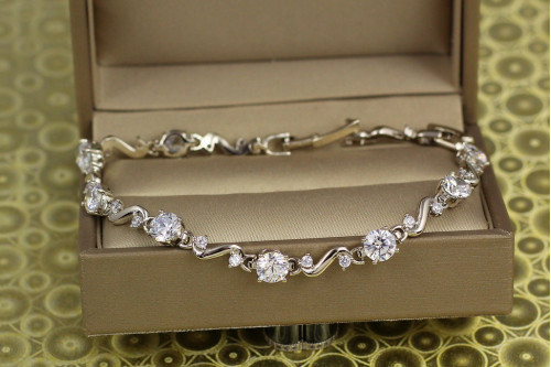 Браслет Xuping Jewelry хвиля з крупними білими каменями 19 см 5 мм сріблястий