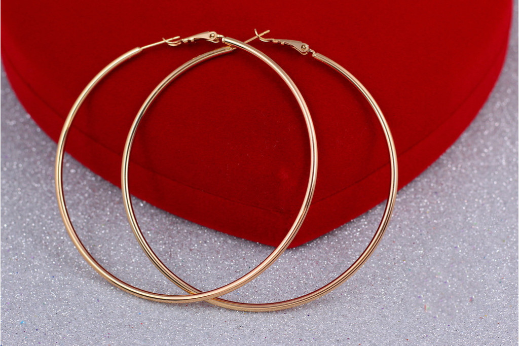 Сережки кільця Хuping Jewelry гладкі 7 см золотисті