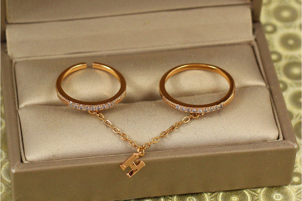 Кільце Xuping Jewelry Два колечка, поєднані цепочкою золотисті