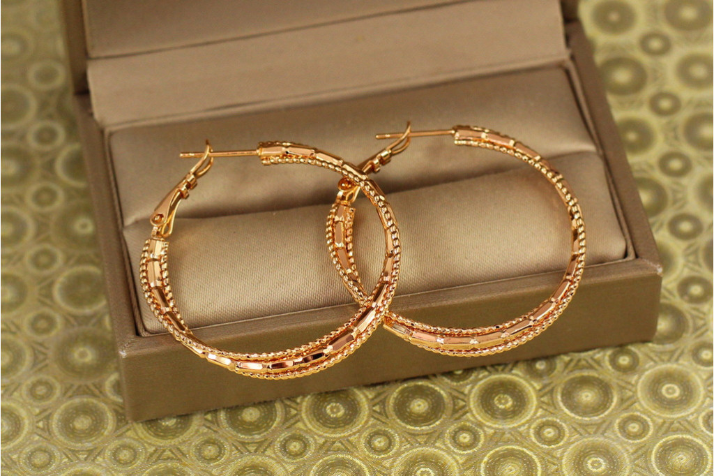 Сережки кільця Хuping Jewelry кручені серпантин 3,5 см золотисті