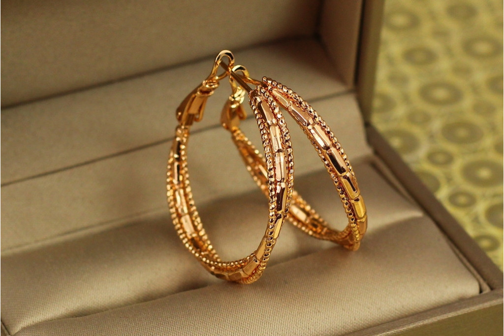 Сережки кільця Хuping Jewelry кручені серпантин 3,5 см золотисті