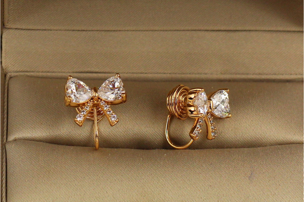 Серьги клипсы Xuping Jewelry Бантики 1,5 см золотистые