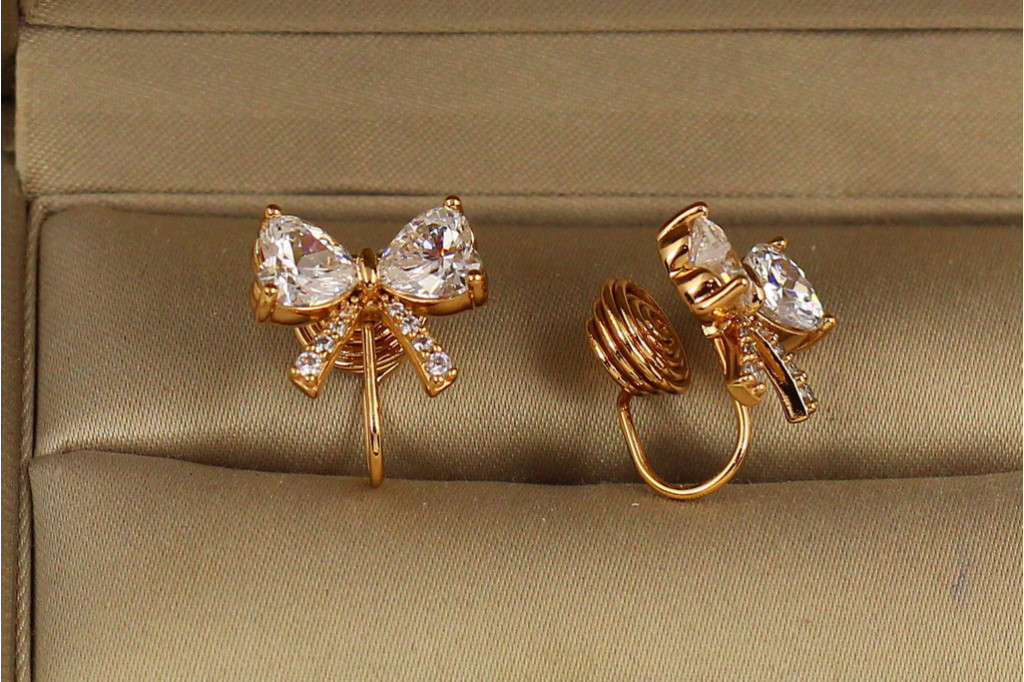 Серьги клипсы Xuping Jewelry Бантики 1,5 см золотистые