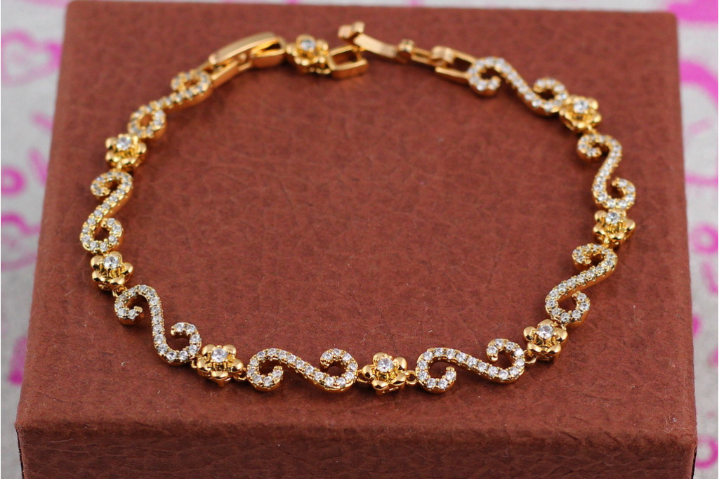 Браслет Xuping Jewelry квітковий завиток 21.5 см золотистий