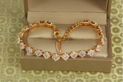 Браслет Xuping Jewelry Льодяні ромби з білими каменями 17 см золотистий