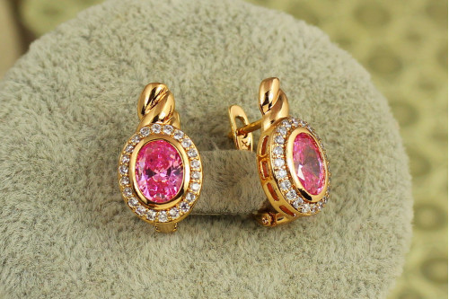 Сережки Xuping Jewelry Магічний овал з рожевим каменем 1.7 см золотисті